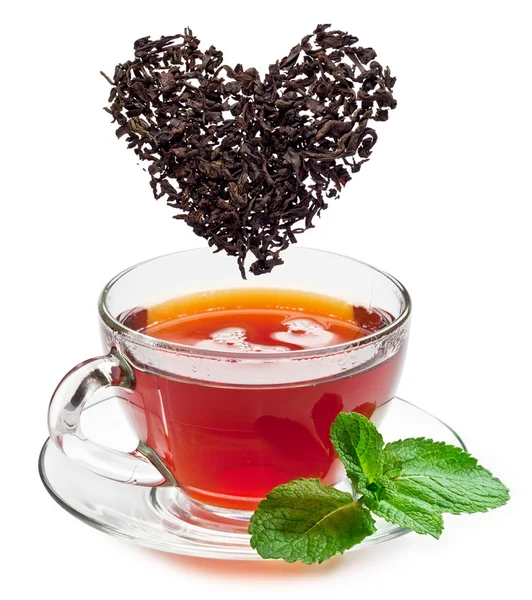 Taza de hojas de té y té. — Foto de Stock