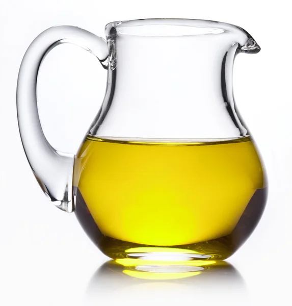 Small jug with olive oil. — Stock Photo, Image