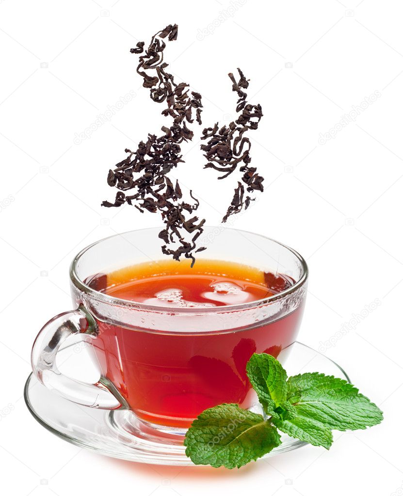 Cup of tea and tea leaves.