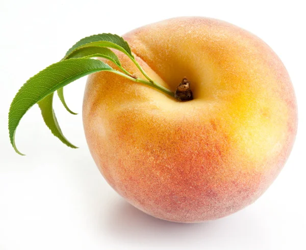Ripe peach with leaves — Stock Photo, Image