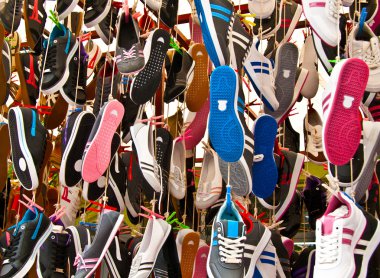 Hanged Colorful Sport Shoes clipart