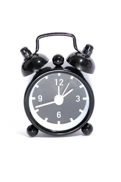 Reloj despertador negro Imagen de archivo