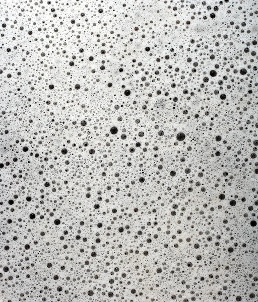 Φυσαλίδες από το βρώμικο νερό με σαπουνάδα υπόβαθρο. — Φωτογραφία Αρχείου