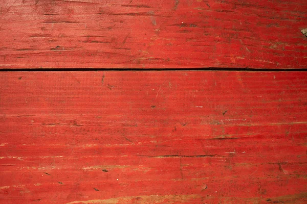 Knäckt röda målade plankor — Stockfoto