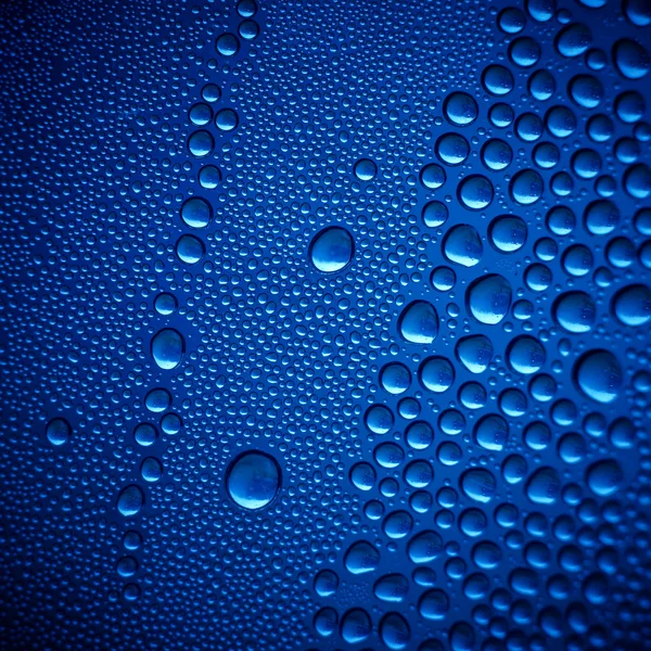 Γαλάζιες σταγόνες νερού — Φωτογραφία Αρχείου