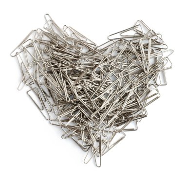 Stationery love concept. Heart shaped staples background. clipart