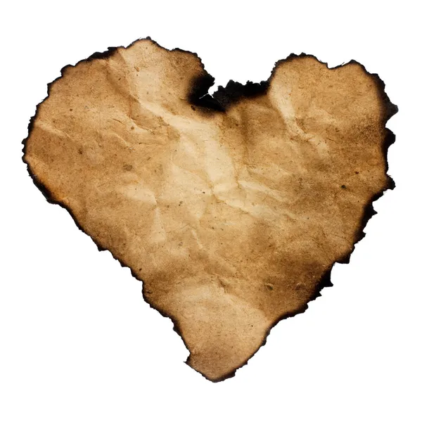 Burned heart-shaped paper isolated on white. — Stock Photo, Image