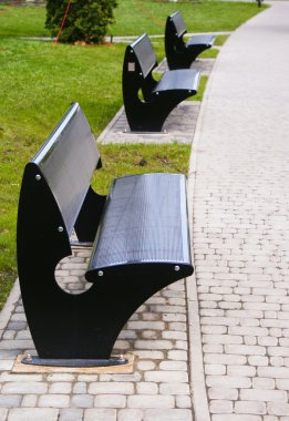 Vacant metal benches clipart