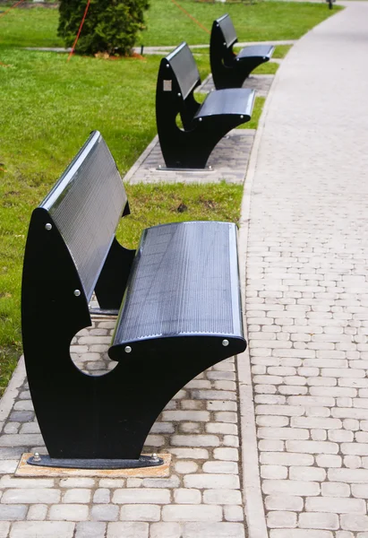 stock image Vacant metal benches