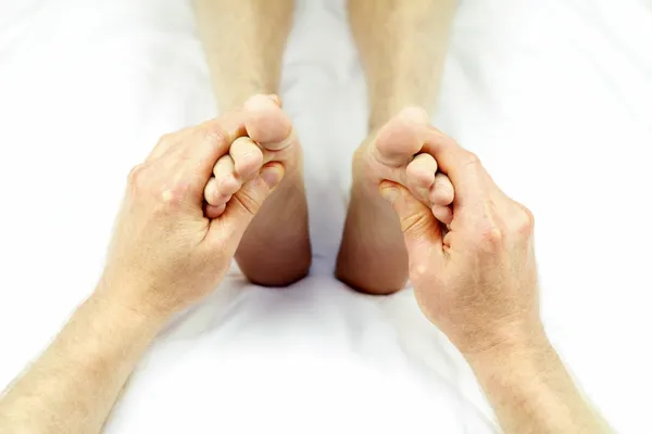 Rubbing Feet Up — Stockfoto