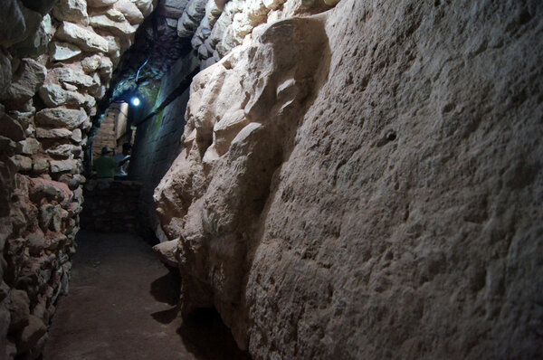 Underground tunnel with sculpture in Copan, Honduras
