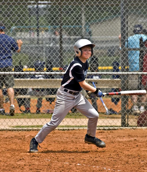 Boy 's Baseball Batter — стоковое фото