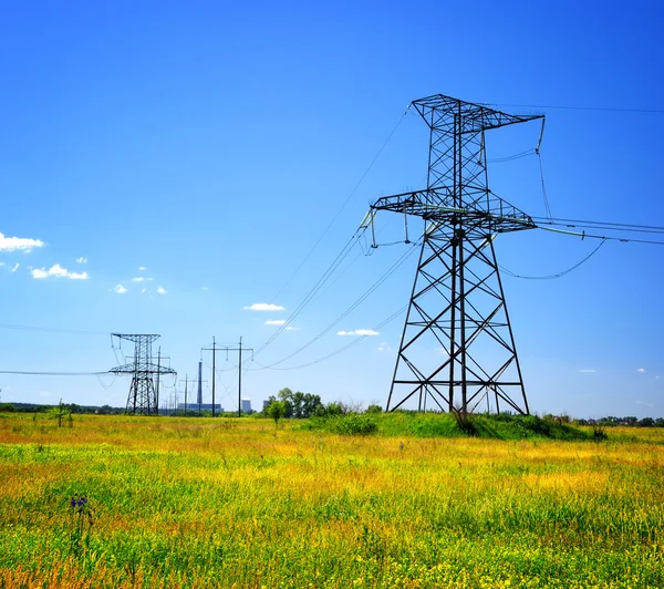 Stock image High voltage power line in the field