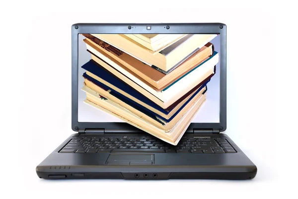 Books at monitor of laptop — Stock Photo, Image