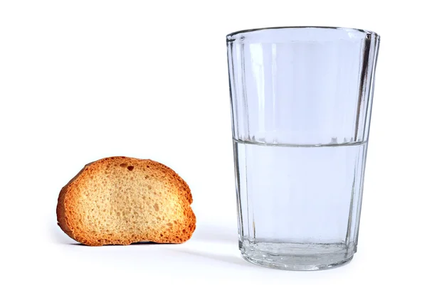 Bread and glass with water — Stock Photo, Image