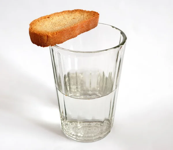 Pan y vaso con agua —  Fotos de Stock