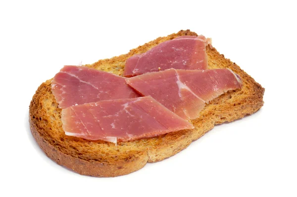 Spanischer Jamon auf einem Toast — Stockfoto
