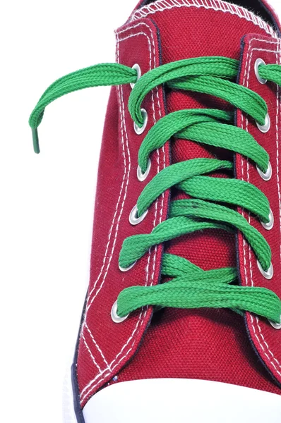 Primeros planos de una zapatilla roja — Foto de Stock