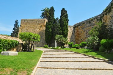Archaeological Walk, with monumental roman walls, in Tarragona, clipart