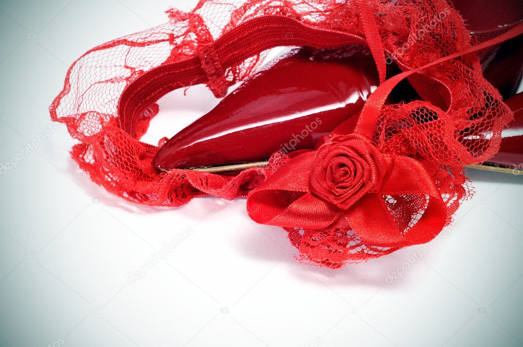 Red garter and pointy shoes