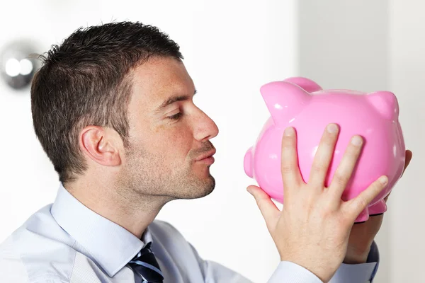 Kinssing piggy bank — Stock Photo, Image