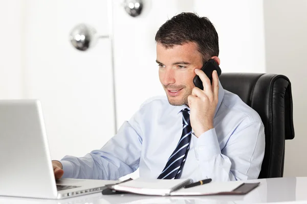 On the phone at work — Stock Photo, Image