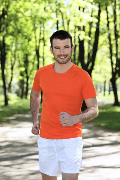 Running in a park — Stock Photo, Image