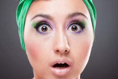 Surprised pin-up woman with open eyes and mouth clipart