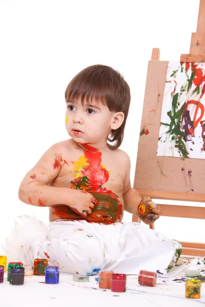 Funny child play with paints — Stock Photo, Image