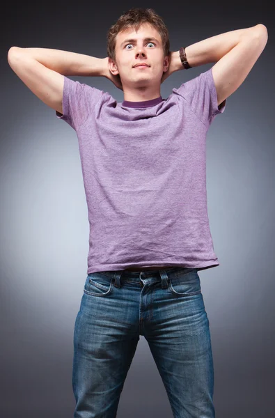 Surprised young attractive man — Stock Photo, Image