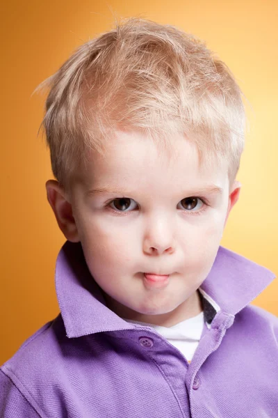 Cute child making funny expression — Stock Photo, Image