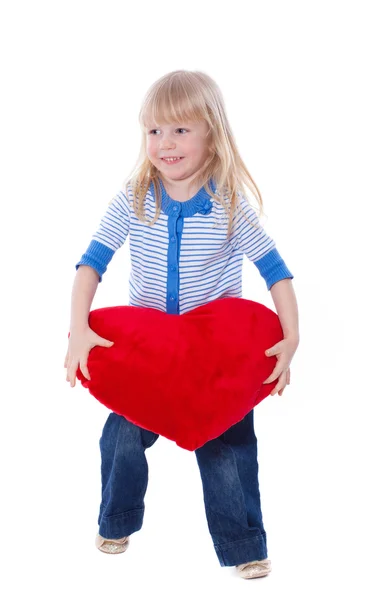 Schattig kind spelen met rood hart — Stockfoto