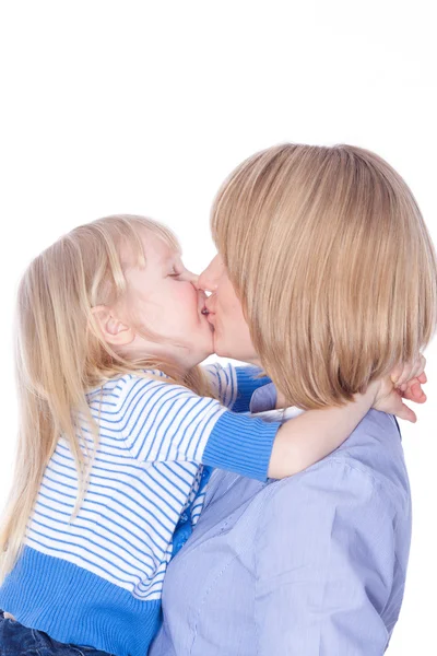 Child embrace and kiss happy mom — Stock Photo, Image