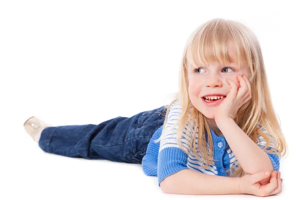 Happy smiling little girl lie — Stock Photo, Image