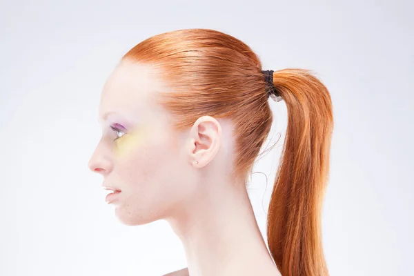 Beautiful profile of red-haired woman — Stock Photo, Image