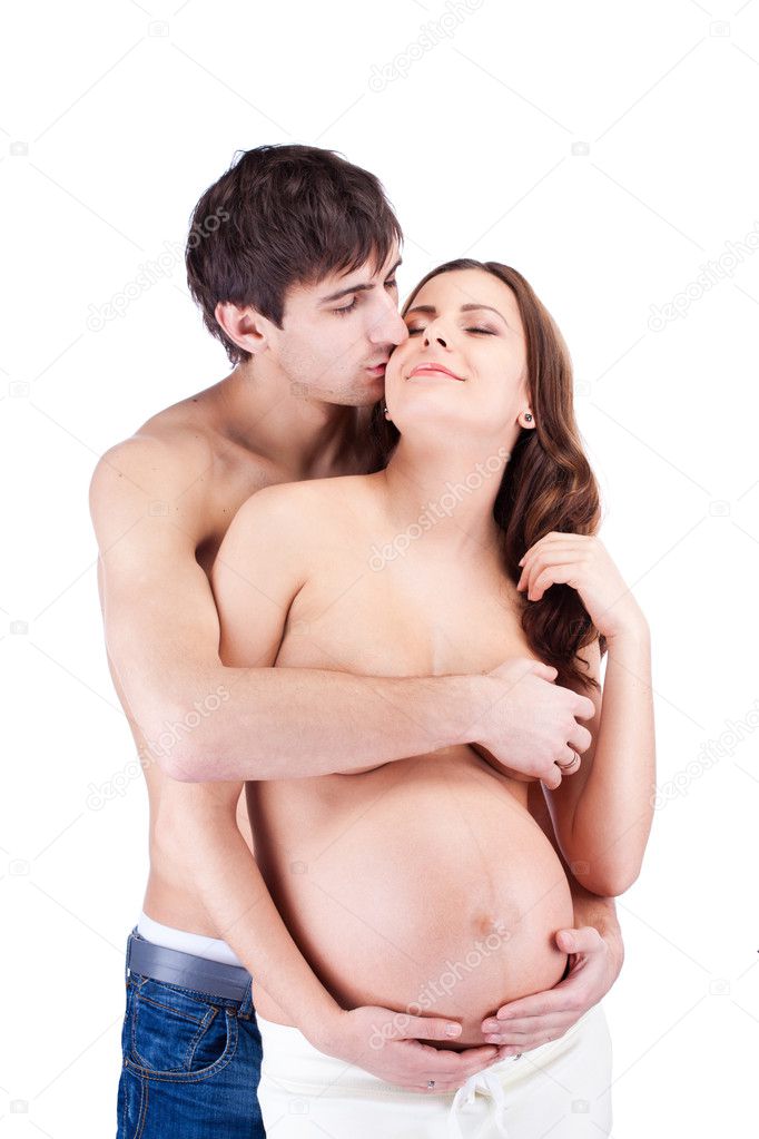 Happy man embrace pregnant woman
