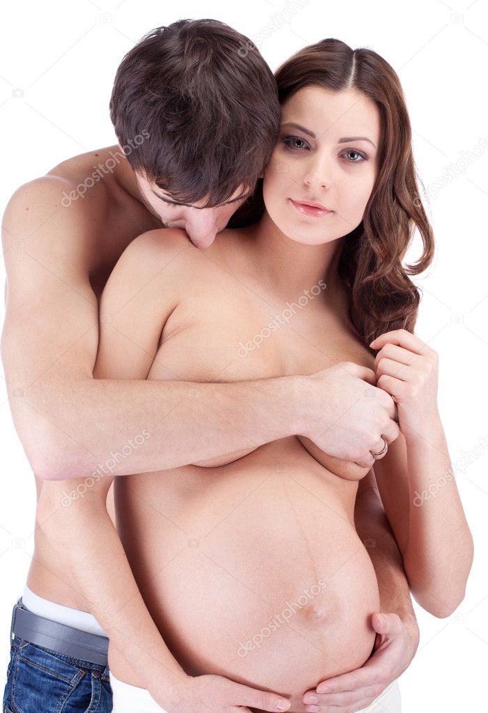 Happy man kiss pregnant woman in shoulder