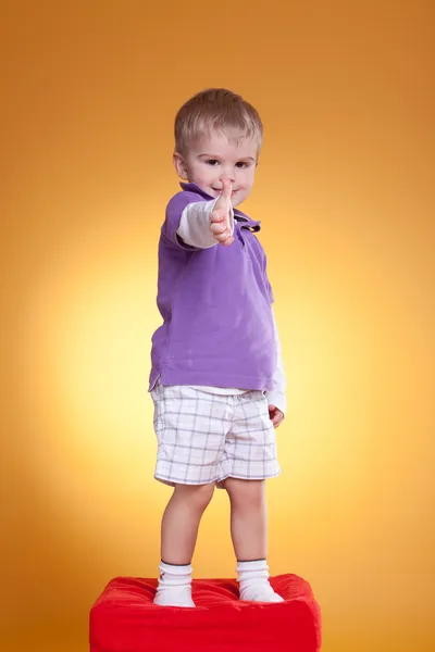 Little happy boy showing ok sign — Stock Photo, Image