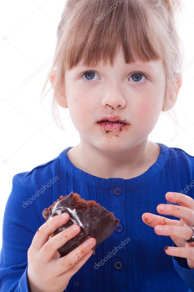 Funny little girl eating chocolate cake — Stock Photo © Mitrofan #5868615