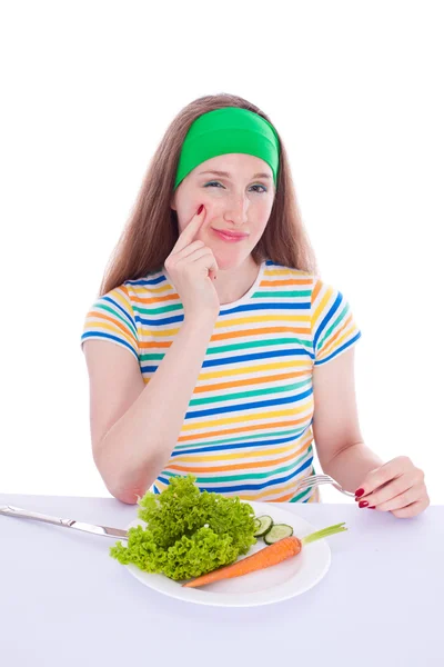 Deciding smiling woman eat carrot and lettuce — Stock Photo, Image