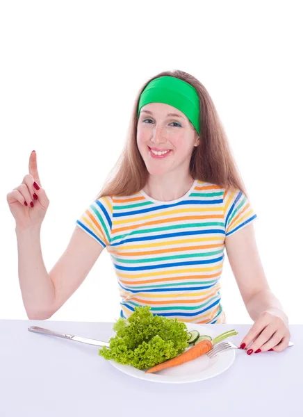 Smiling woman pays attention on healthy food — Stock Photo, Image