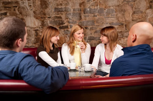 stock image Group of five having fun in cafe