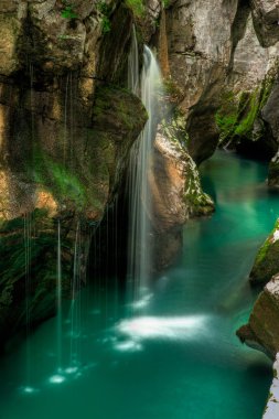 Small waterfal in Soca river valey Slovenia clipart