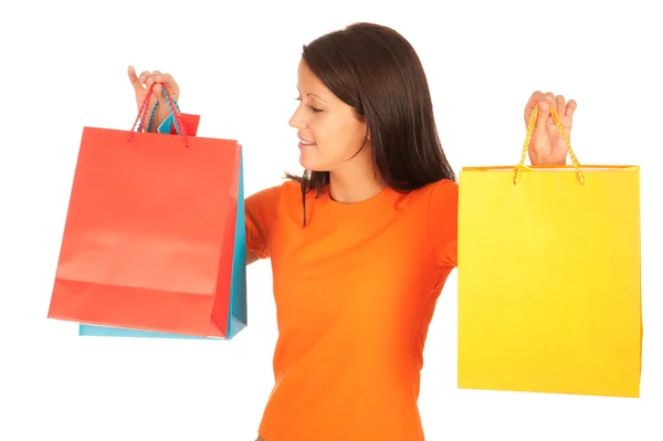 Vásárlás - aranyos fiatal lány, elszigetelt fehér bevásárló táskák — Stock Fotó