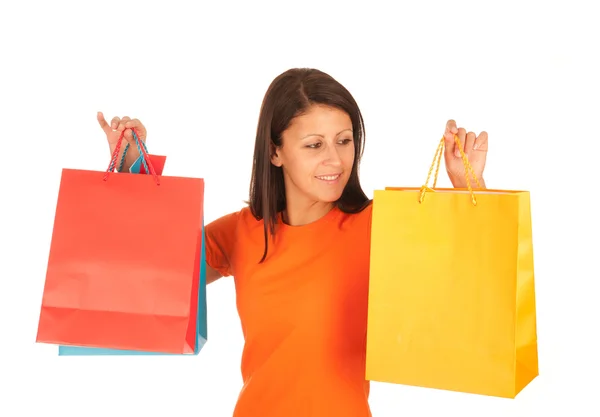 Nakupování - roztomilá mladá dívka s nákupní tašky izolované na bílém — Stock fotografie