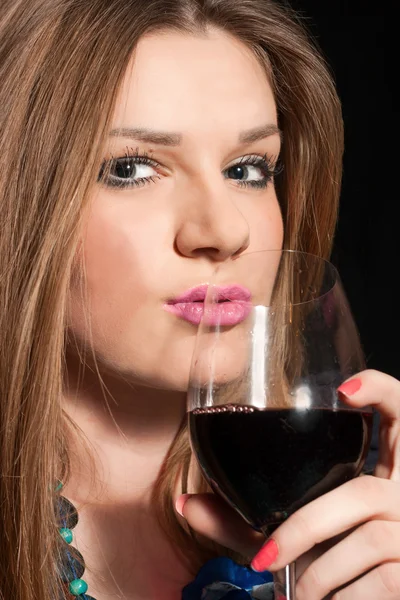 stock image Young woman drinking wine