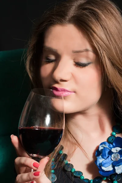 stock image Young woman drinking wine