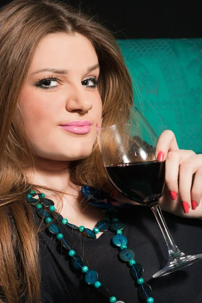 stock image Young woman drinking wine