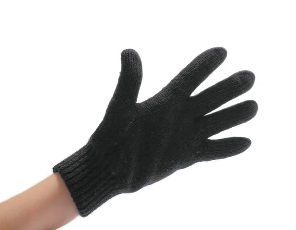 stock image Hand in a black woollen glove on a white background