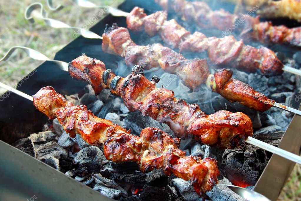 Grilled barbecue sticks cooking on coals on mangal — Stock Photo ...